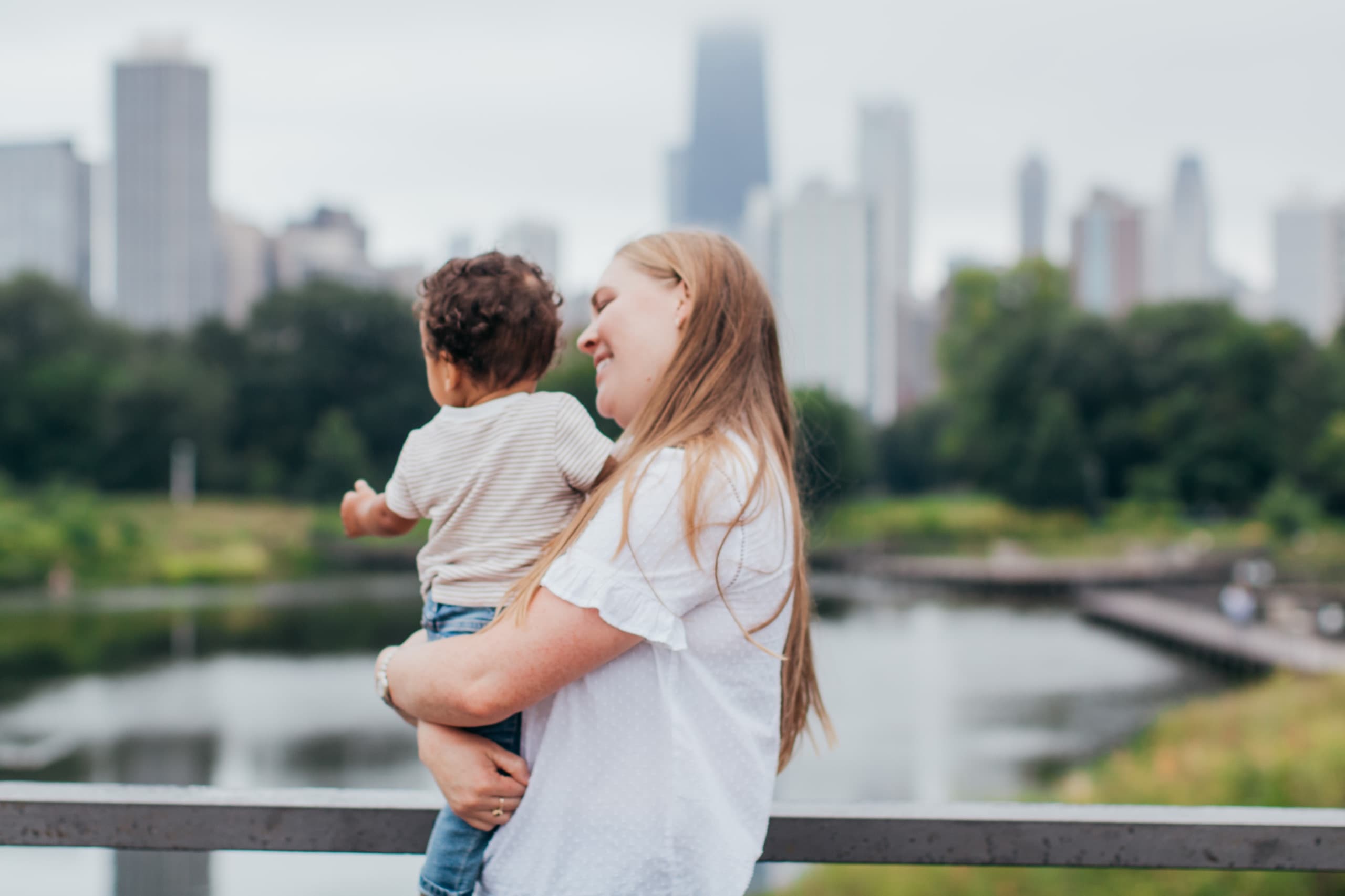 Parent holding baby - warm, authentic moment